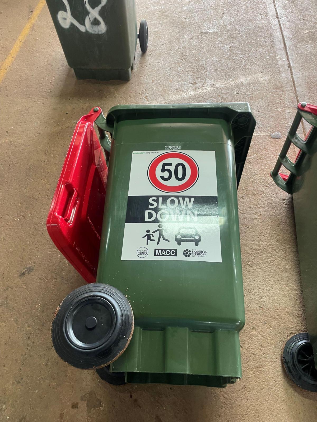 50kph speed limit bin sticker on wheelie bin